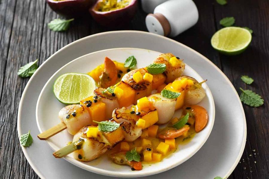 Grilled mango and passion fruit scallops skewers